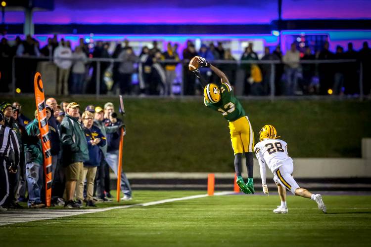Montorie Foster Jr. makes a play for the St. Edward Eagles his senior year.